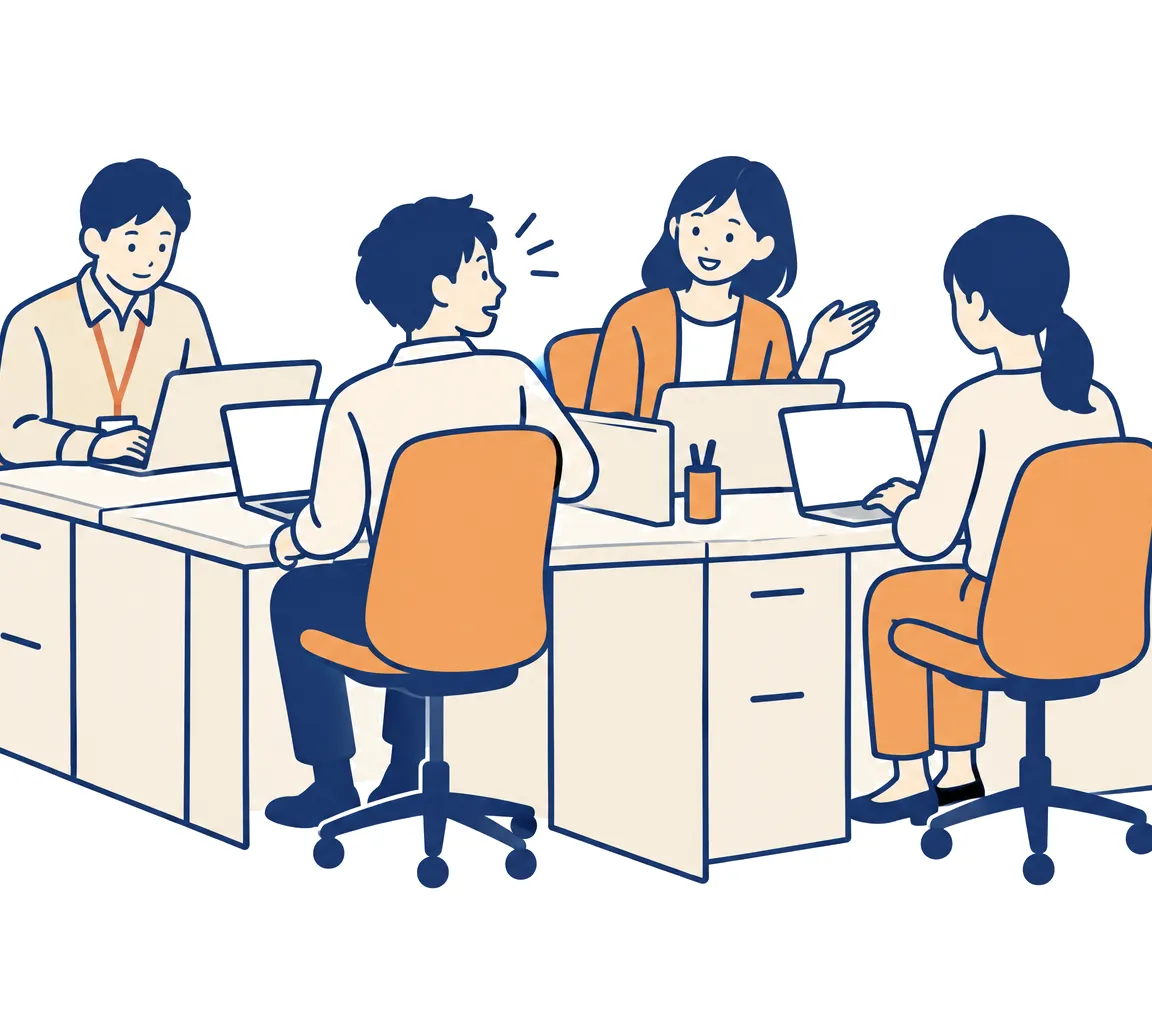 小さな事務所で、社員が振り返って後ろの席の人に質問し、その場で答えてもらっている
